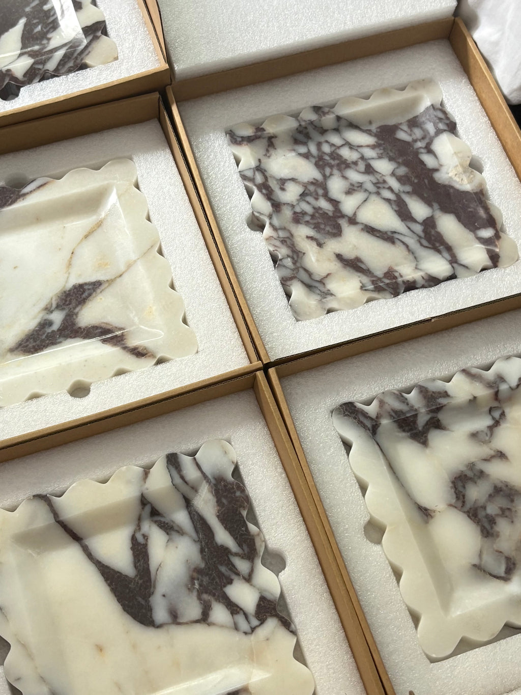 Natural Calacatta Viola Marble Tray
Our most loved classic calacatta marble from Turkey is a statement for your space. The colour & veining is unique to each cut.

Use it to display an array of your everyday staples, candles, jewellery, skin care, or even as a statement trinket on a coffee table. The options are endless!

Refined, luxurious & polished.

MATERIAL*
Luxurious thick Calacatta Viola marble. approx 2cm.