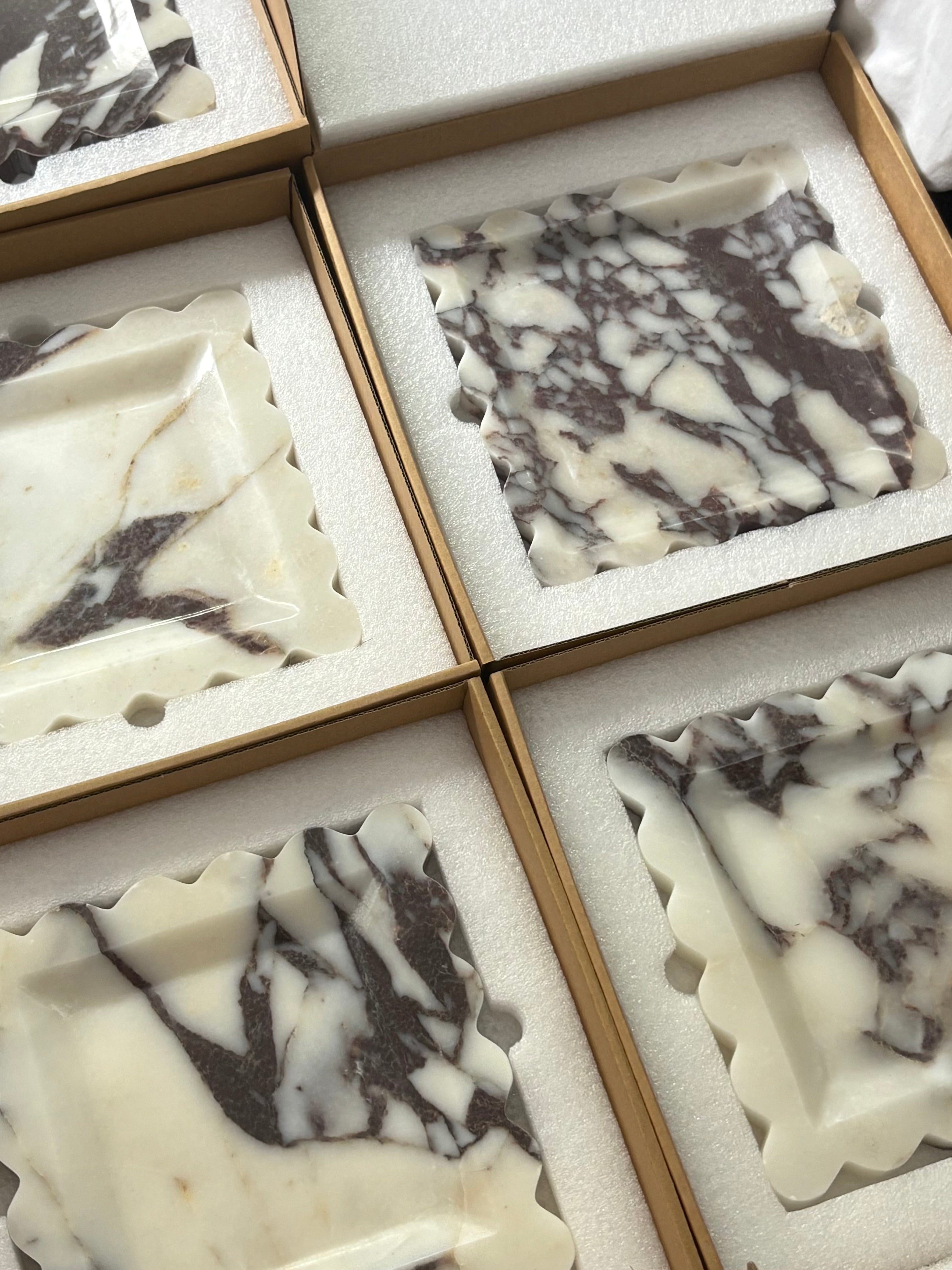 Natural Calacatta Viola Marble Tray
Our most loved classic calacatta marble from Turkey is a statement for your space. The colour & veining is unique to each cut.

Use it to display an array of your everyday staples, candles, jewellery, skin care, or even as a statement trinket on a coffee table. The options are endless!

Refined, luxurious & polished.

MATERIAL*
Luxurious thick Calacatta Viola marble. approx 2cm.