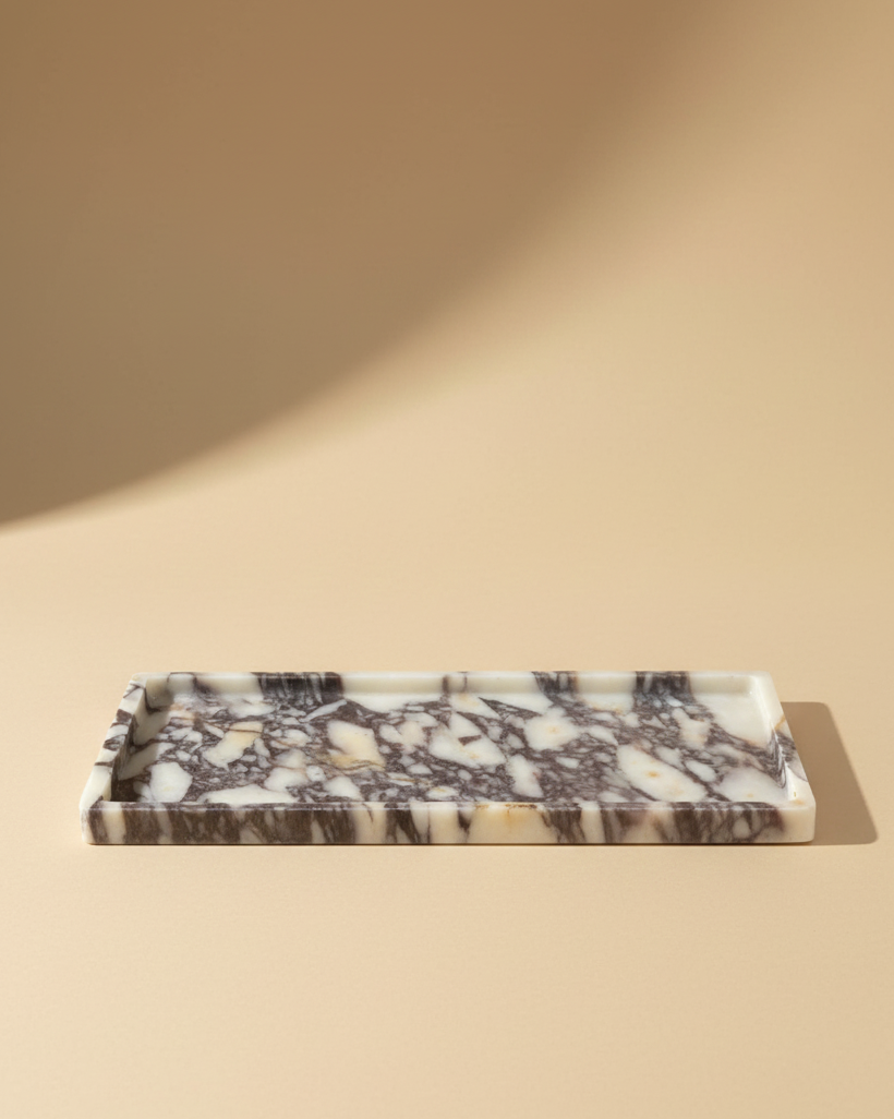 Natural Large Calacatta Viola Marble Tray

Our most loved classic calacatta marble from Turkey is a statement for your space.&nbsp;The colour &amp; veining is unique to each cut.

Use it to display an array of your candles, perfume, skin care, in your kitchen or coffee station or even as a statement piece on a coffee table. The options are endless!

Refined, luxurious &amp; polished.


MATERIAL*
Luxurious thick Calacatta Viola marble. approx 2cm.

SPECIFICATIONS*
40x20cm