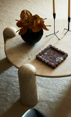 natural rosa levanto burgundy marble scallop tray on travertine round table in living room design